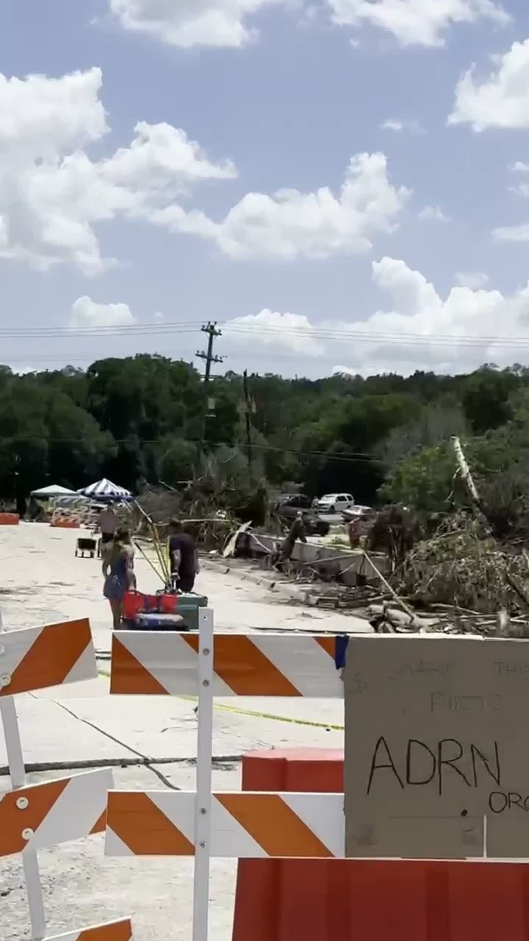 Volunteer staging area behind the barricades in Leander