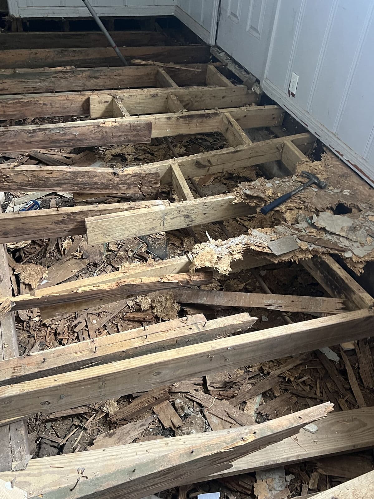 Before: rotted joists under the old floor, Mart, TX
