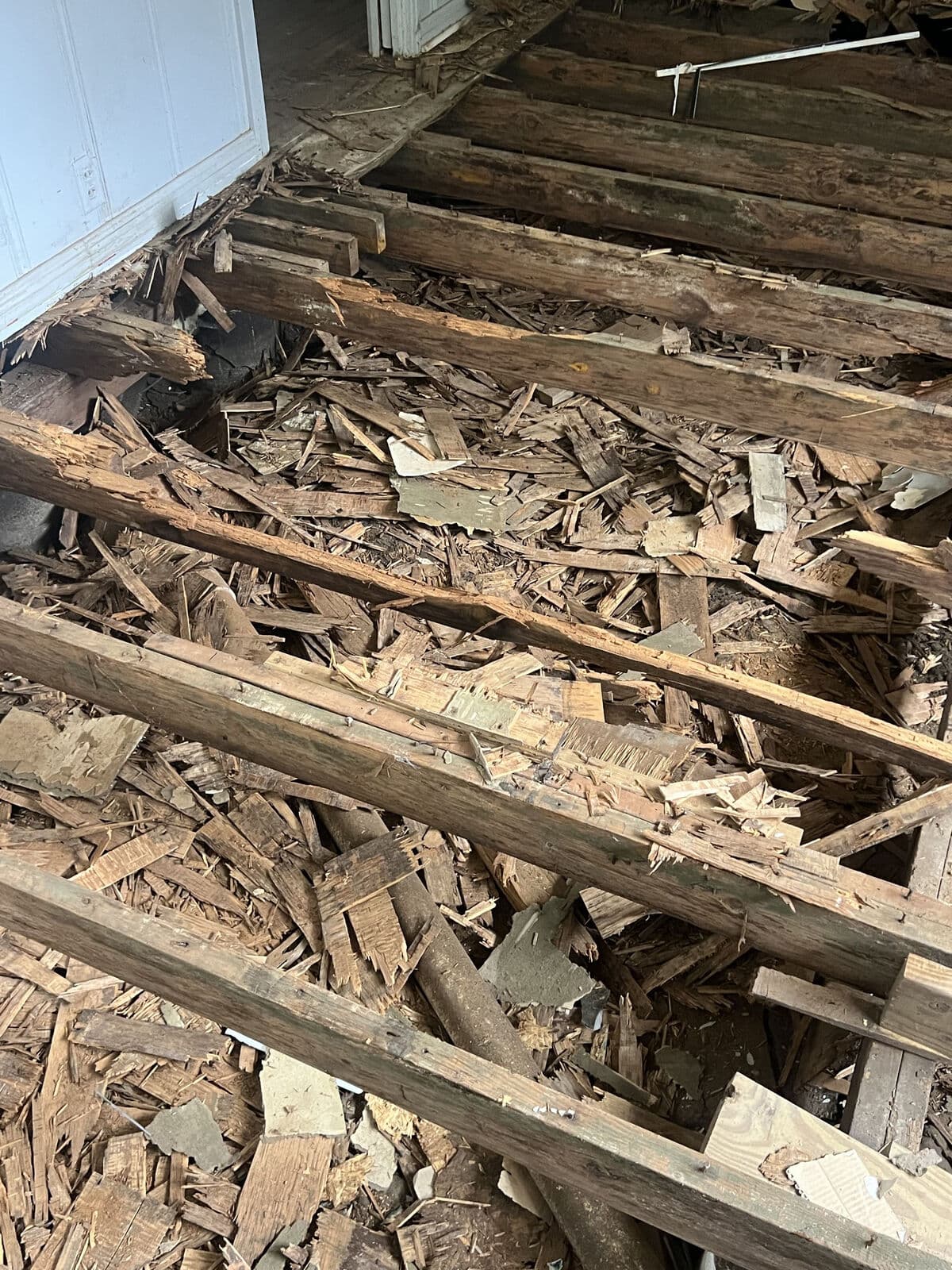 Before: rotted joists under the old floor, Mart, TX