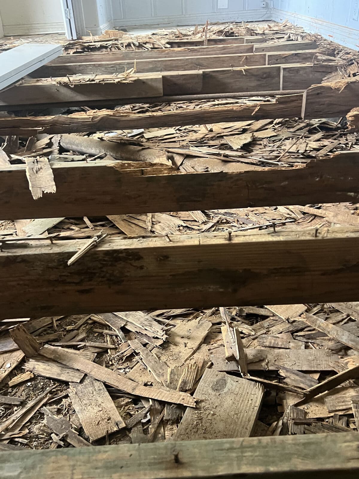 Before: rotted joists under the old floor, Mart, TX